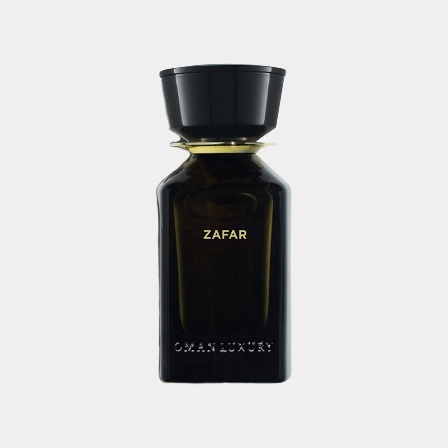 Omanluxury Zafar Sample is een elegant parfum in een strakke, donkere fles met een gouden accent en de naam ZAFAR prominent weergegeven.