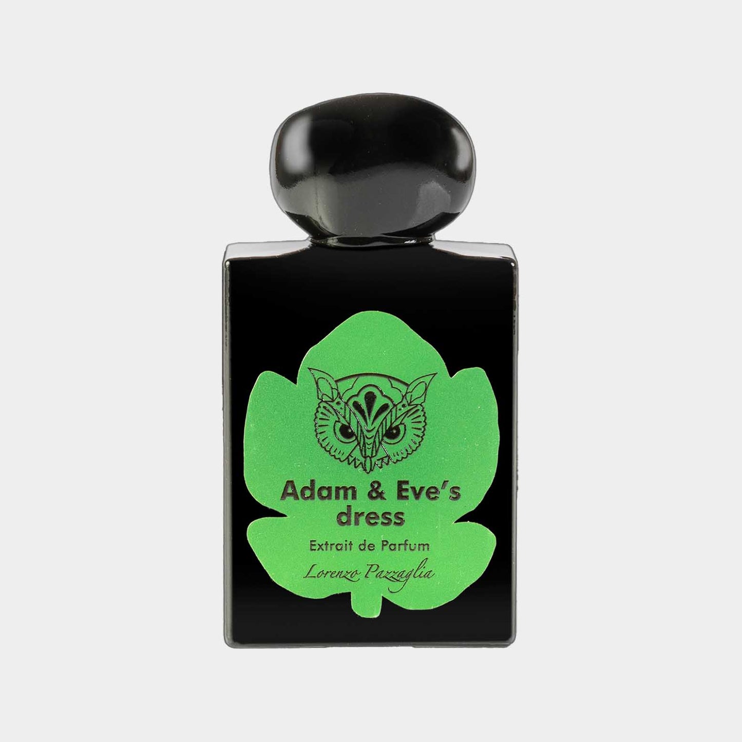 Lorenzo Pazzaglia Adam & Eves Dress Sample, een elegant parfumflesje met een groen bladontwerp en zwarte achtergrond, dat de geur Extrait de Parfum bevat.