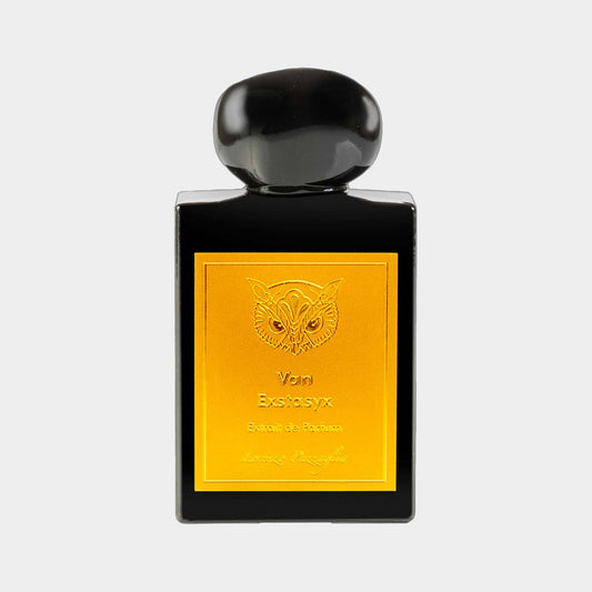 Fles van de Lorenzo Pazzaglia Van Exstasyx Sample, met een elegante zwarte vorm en een gouden etiket met een uillogo, bevat parfumextract.