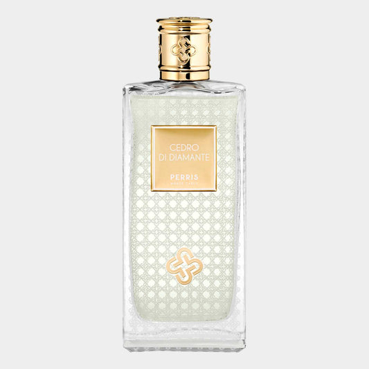Perris Monte Carlo Cedro di Diamante Sample - een elegant parfumflesje met een verfijnde, doorzichtige uitstraling en gouden accenten.