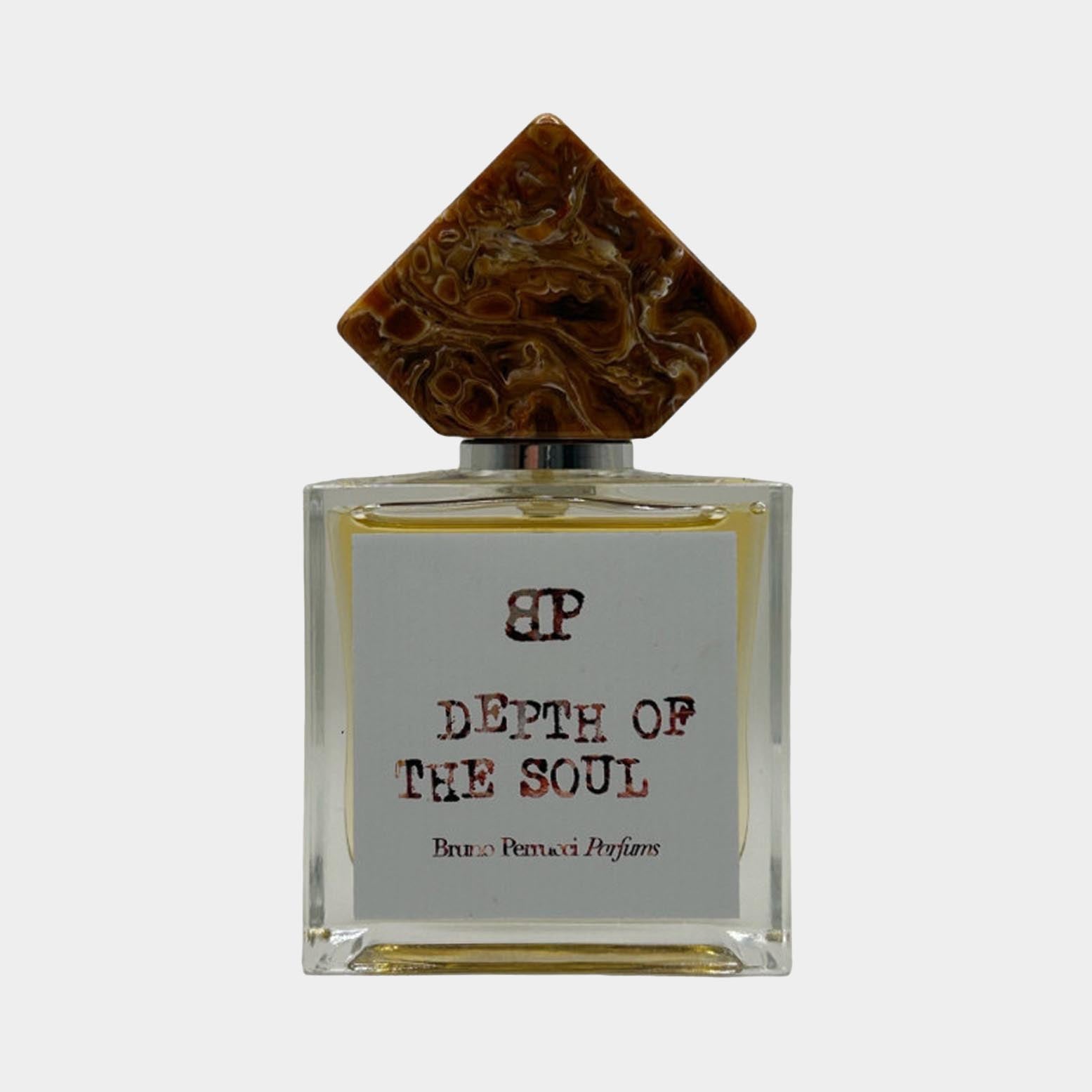 Bruno Perrucci Depth of Soul Sample, een luxueuze parfumfles met een unieke, decoratieve dop en een eenvoudig, elegant etiket.