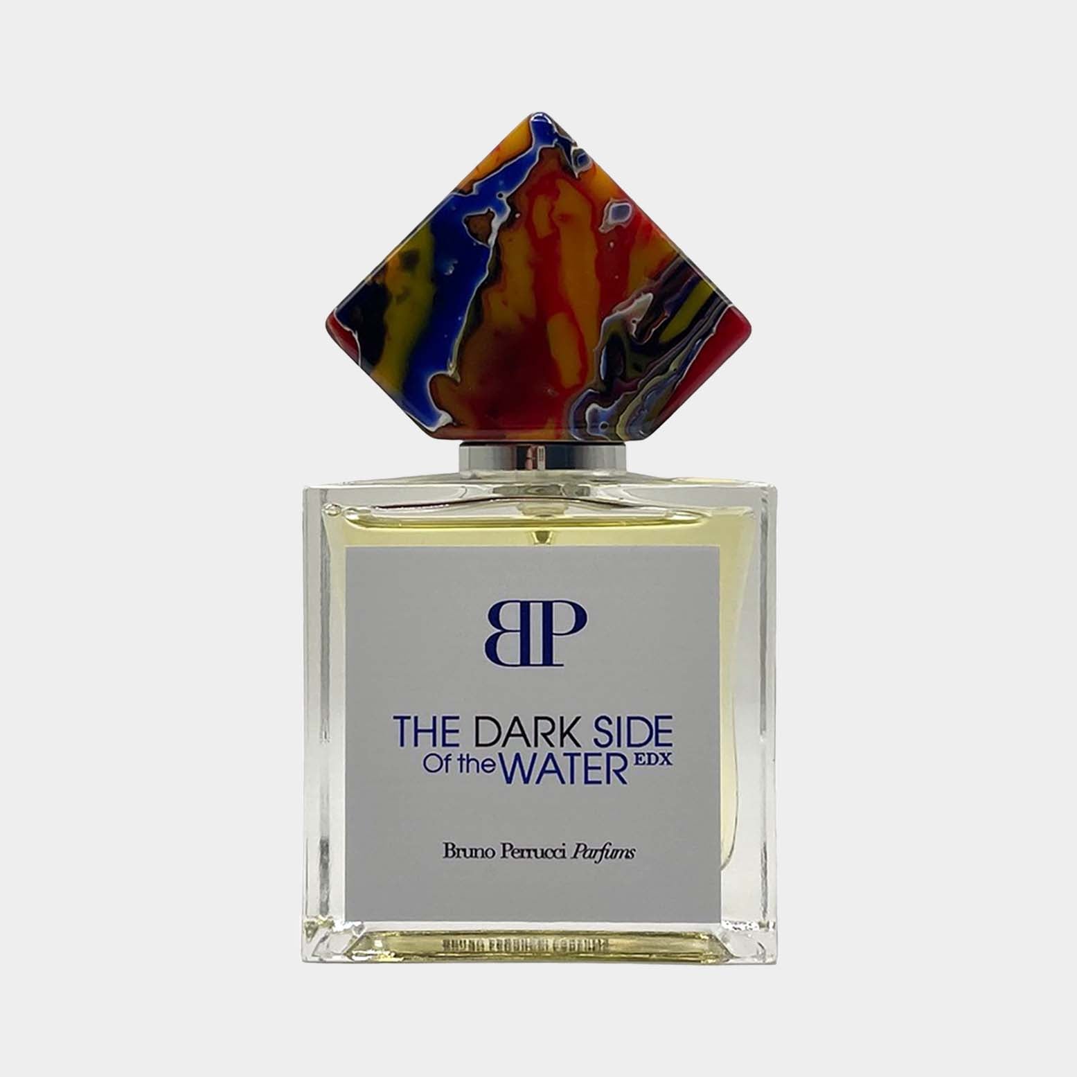 Fles van Bruno Perrucci The Dark Side of the Water Sample met een kleurrijke dop en elegante uitstraling, perfect voor liefhebbers van verfijnde geuren.