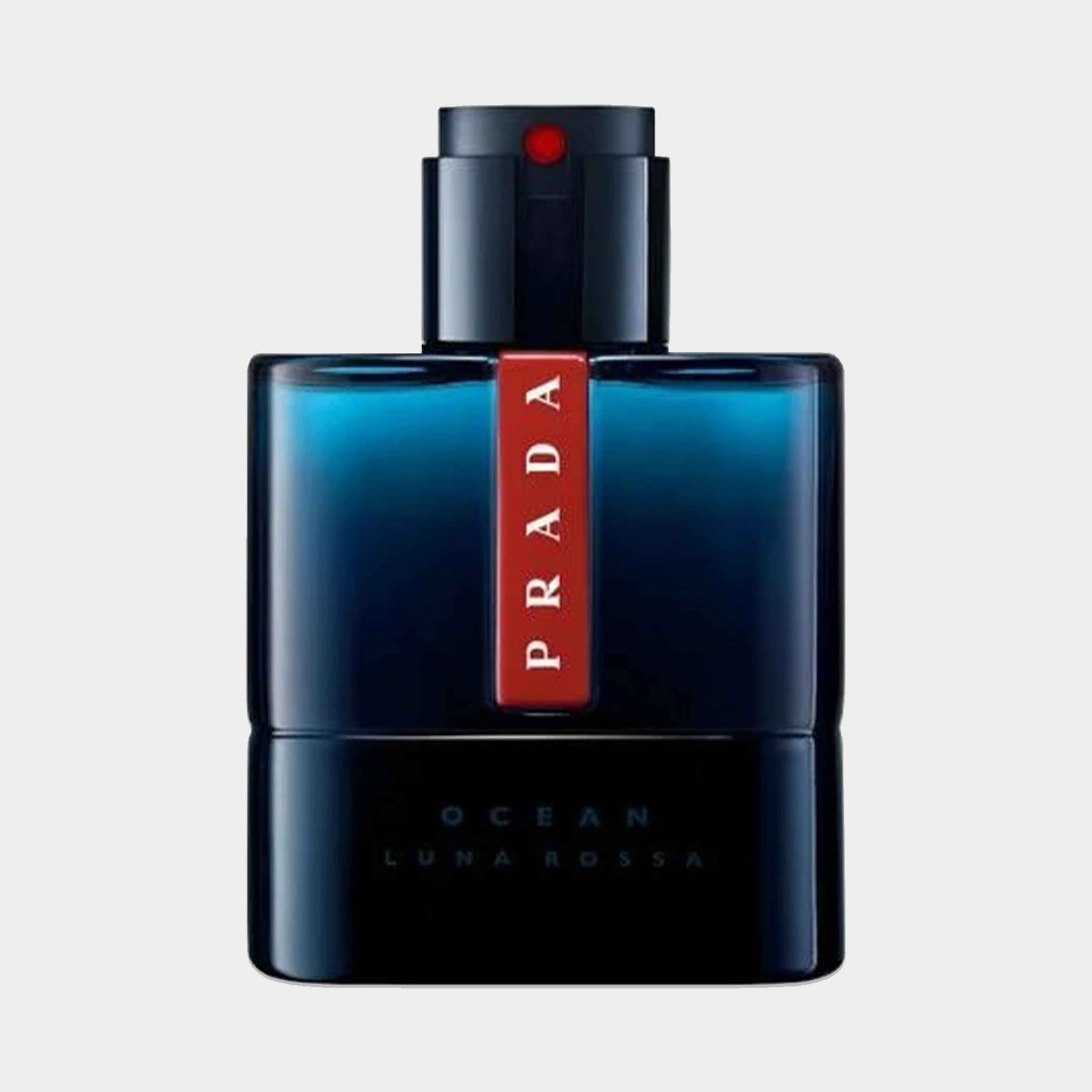 Sample van Prada Luna Rossa Ocean EDP in een luxe, donkerblauwe fles met een opvallend rood etiket.