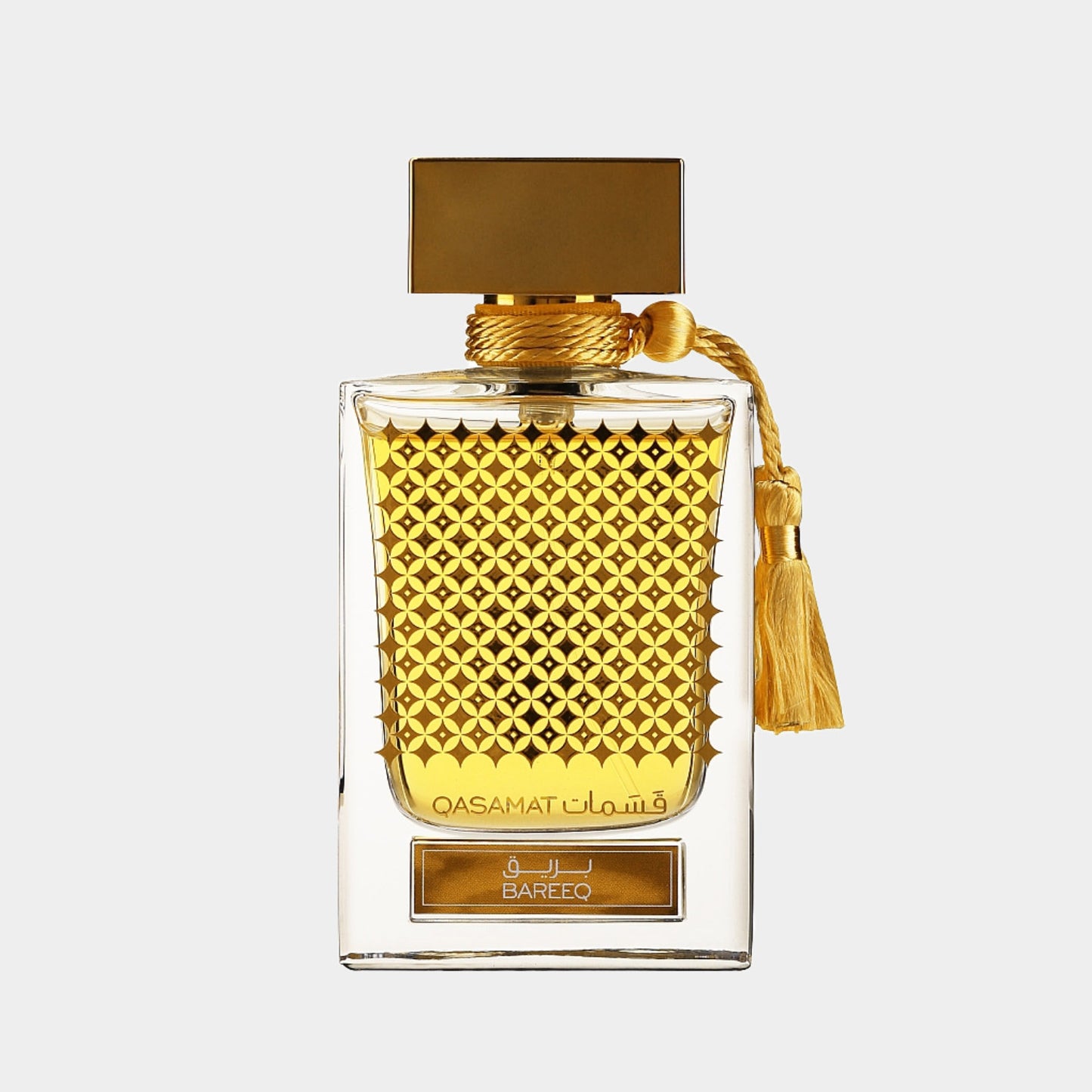 Alt-tack: Rasasi Qasamat Bareeq Sample in een elegant glazen fles met een gouden textuur en een luxe gouden dop, perfect voor een verfijnde geurervaring.