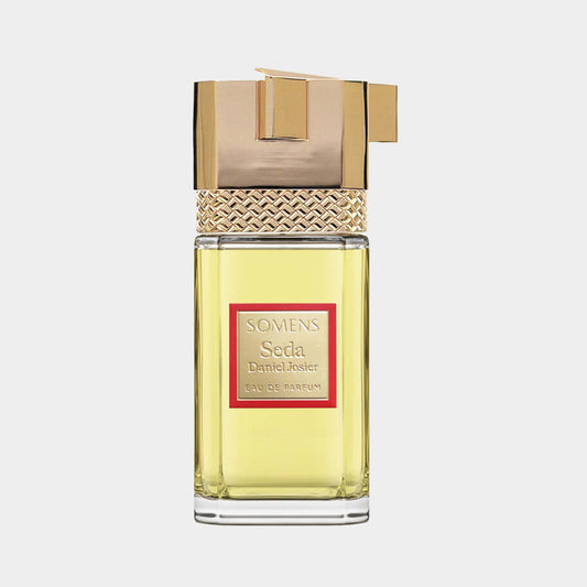Flacon van Somens Seda Sample, een elegante parfum met een gouden dop en een stijlvolle uitstraling.
