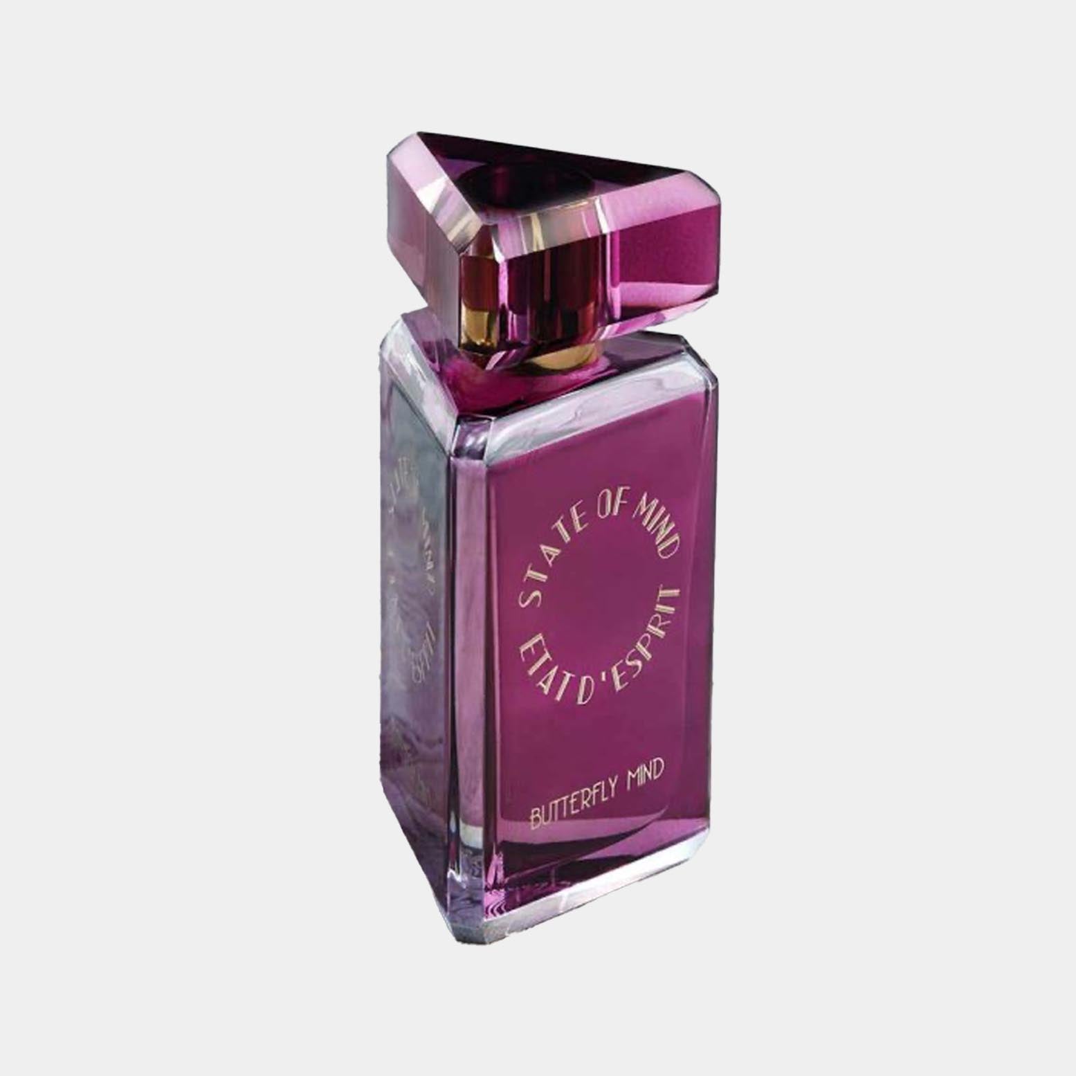 Fles van State of Mind Butterfly Mind, met een opvallende paarse kleur en een unieke driehoekige dop, perfect voor een verfijnde geurervaring.