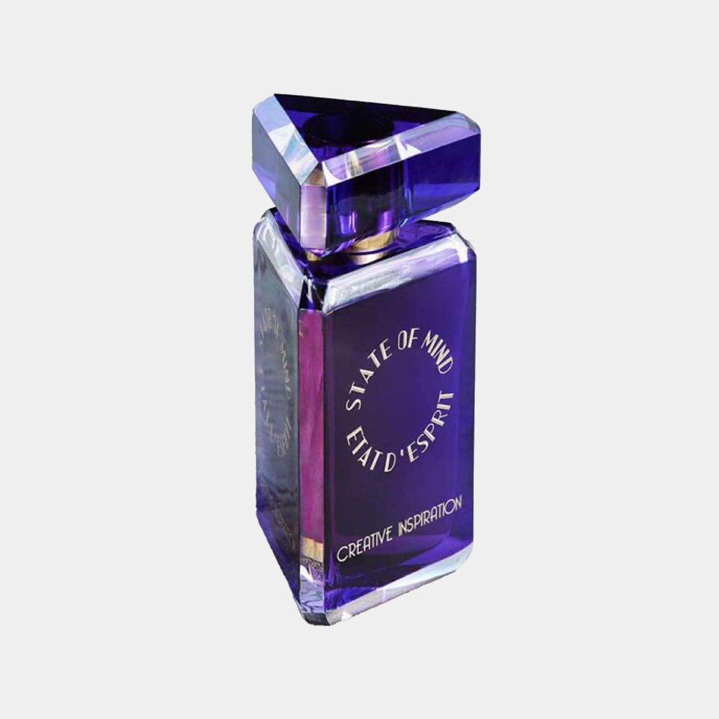 Geurflacon van State of Mind Creative Inspiration, met een unieke paarse driehoekige dop en een elegant ontwerp. Het label benadrukt de creatieve essentie van het parfum.