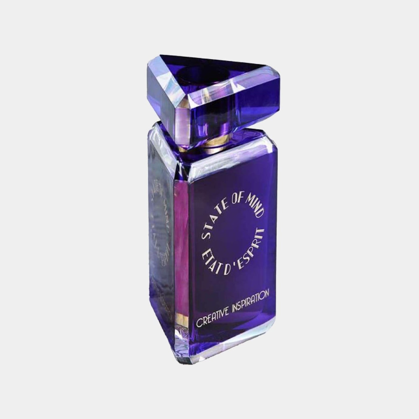 State of Mind Creative Inspiration is een elegant parfum in een unieke paarse fles met een geometrische vorm en luxe afwerking. De verpakking straalt creativiteit en inspiratie uit.