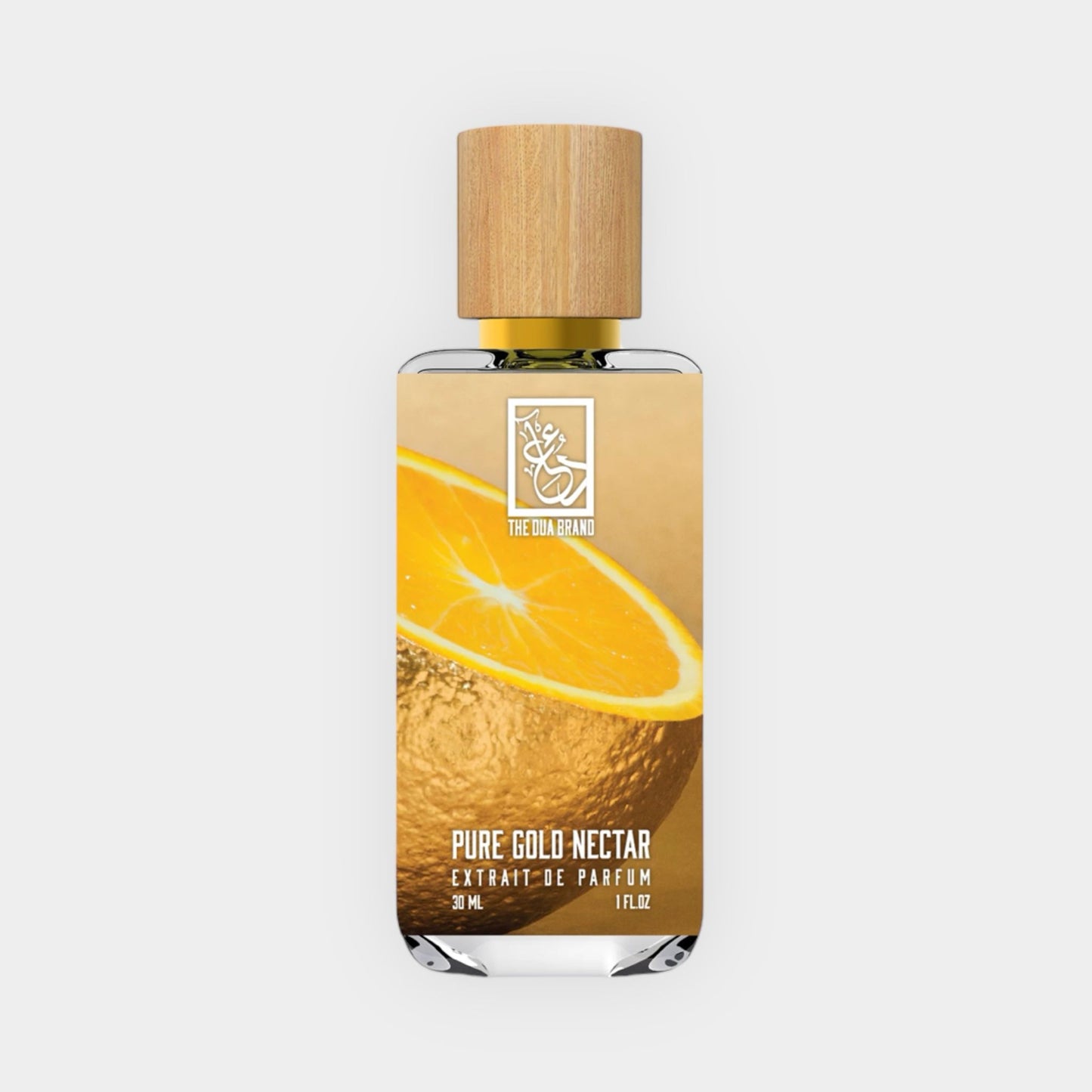 Flesje van Dua Pure Gold Nectar Sample, met een elegante houten dop en een aantrekkelijke afbeelding van een gouden sinaasappel. Dit is een extract de parfum in een verpakking van 30 ml.