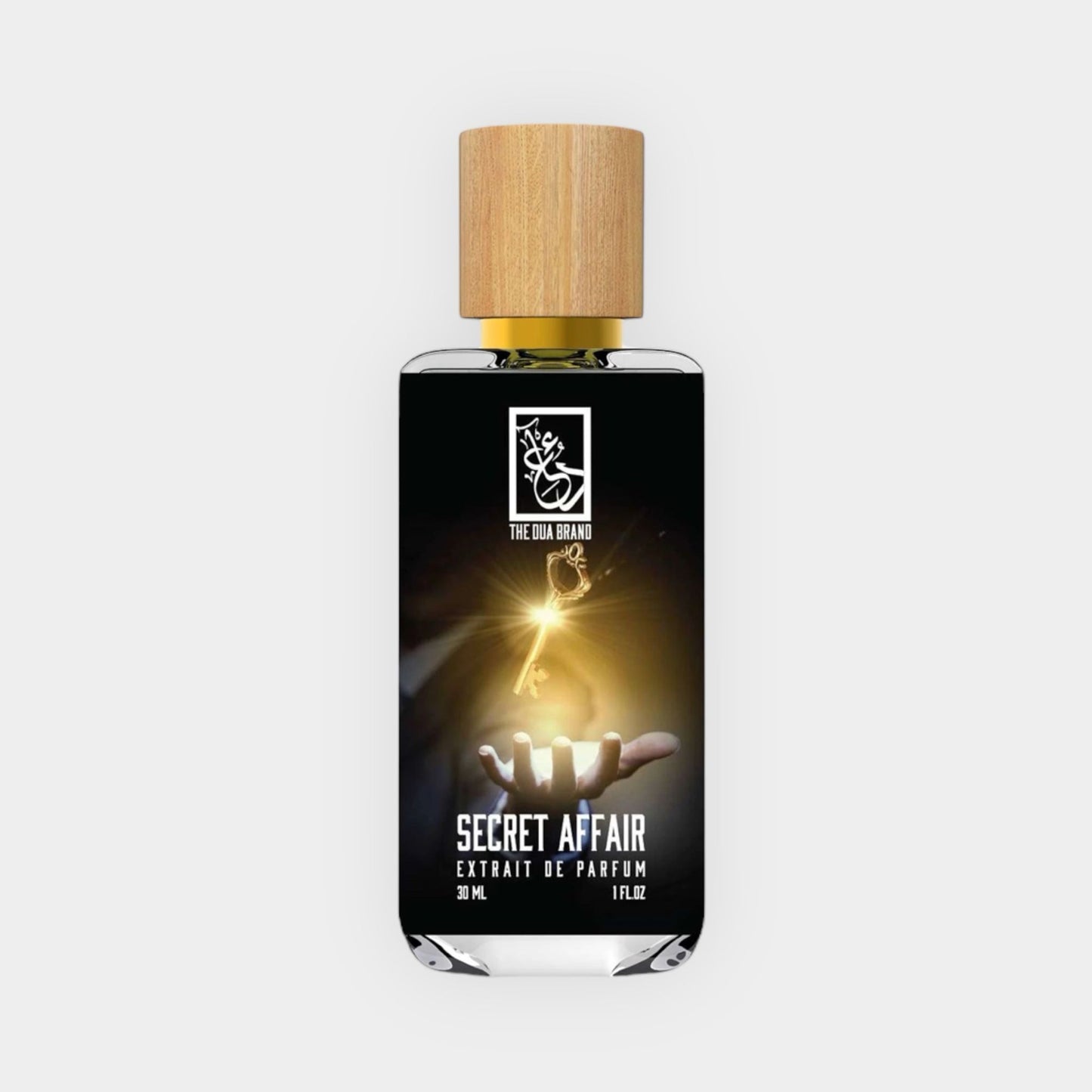 Flesje van 30 ml Dua Secret Affair Sample parfum, met een elegant ontwerp en een houten dop, dat mysterie en allure uitstraalt.