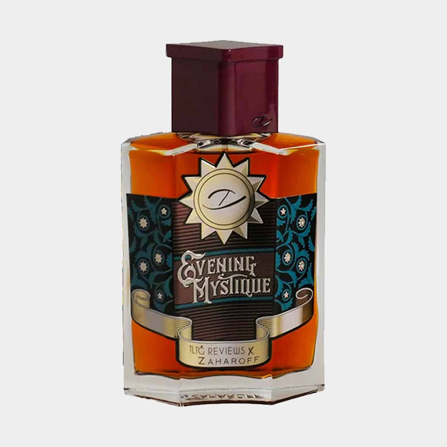 Een kleine samplefles van Zaharoff Evening Mystique, met een opvallend ontwerp en een rijke oranje en groene kleurstelling. Deze geur weerspiegelt elegantie en mysterie, perfect voor avondgebruik.