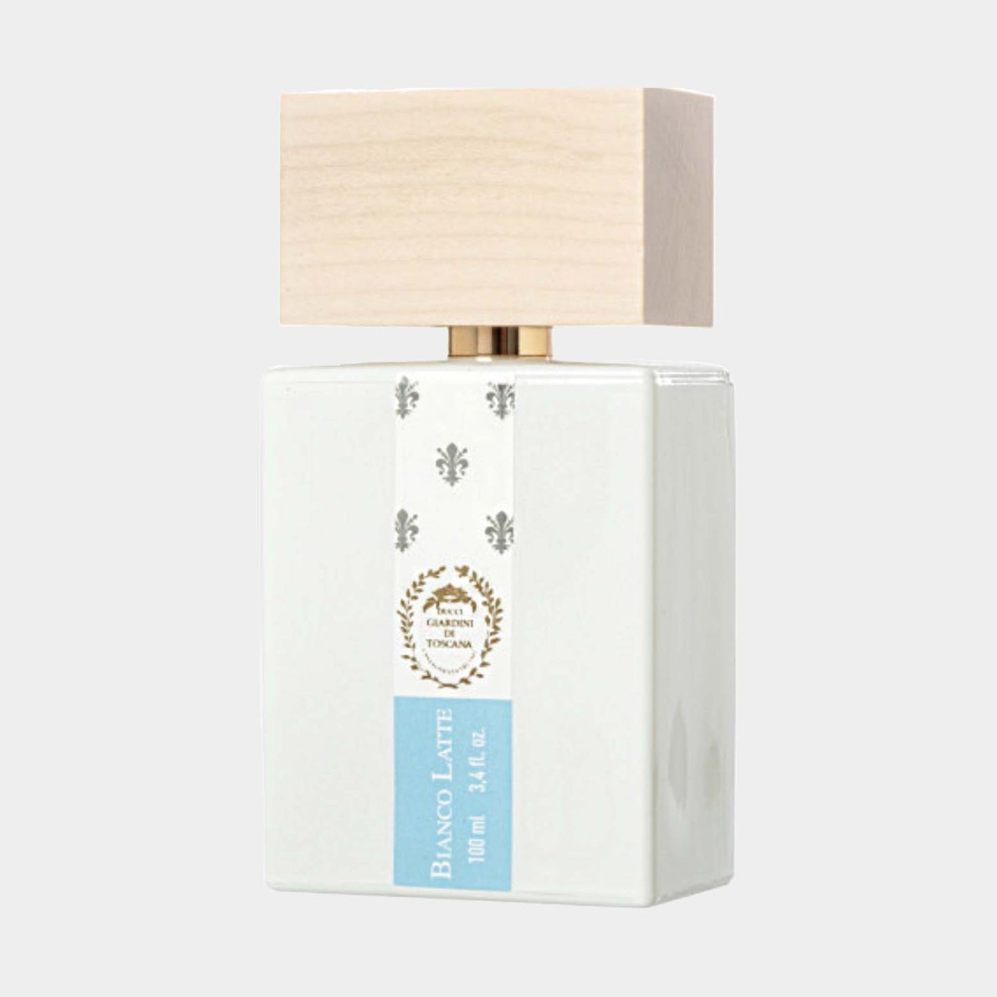 Volledige fles van Giardini Di Toscana Bianco Latte, met een elegante witte verpakking en een houten dop, 100 ml.