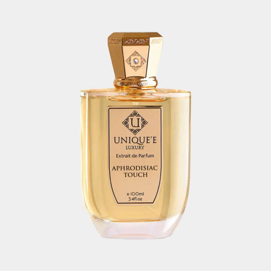 Volledige fles van Uniquee Luxury Aphrodisiac Touch, een luxe parfum met een elegante gouden verpakking, 100 ml.