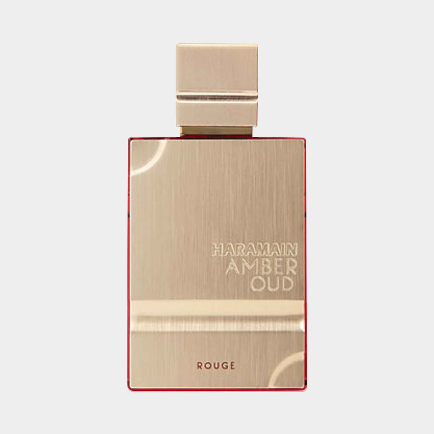 Al Haramain Amber Oud Rouge Sample is een luxe parfum in een elegant, gouden flacon met een opvallende rode rand, perfect voor liefhebbers van rijke geuren.