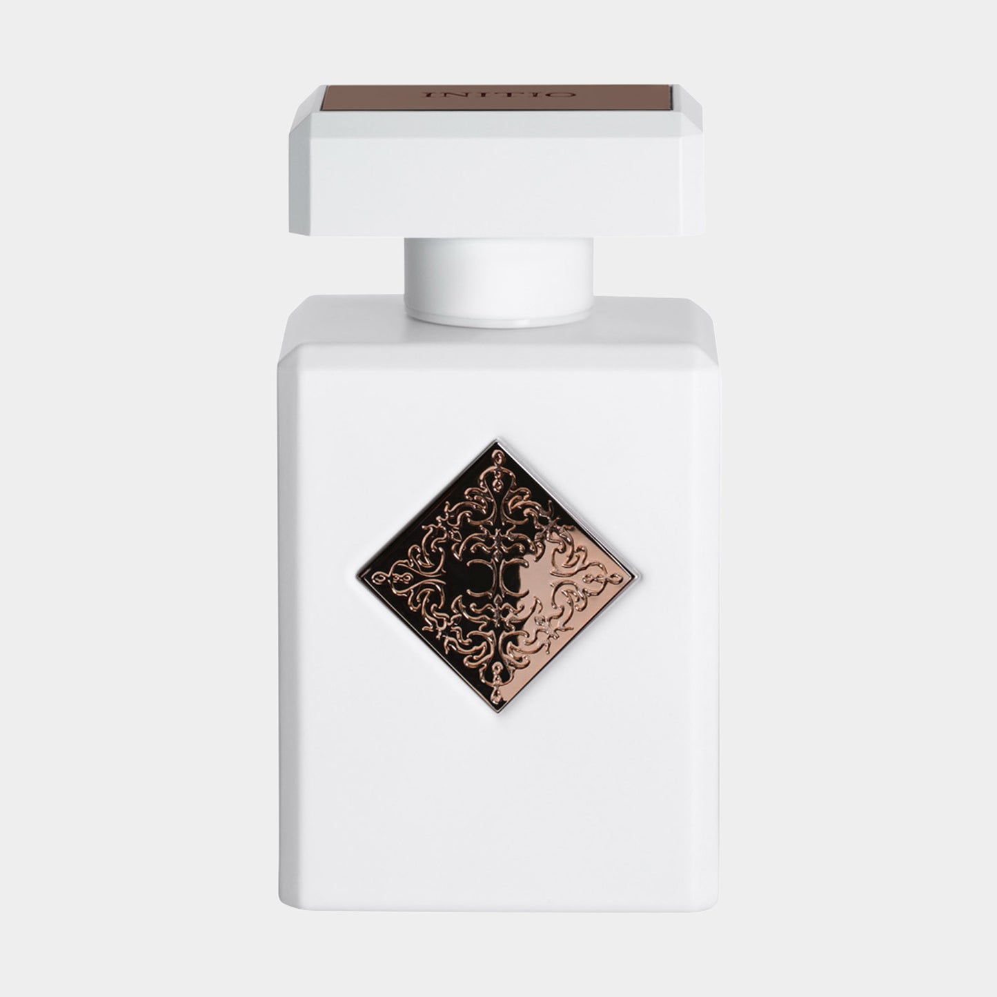 Wit flacon met een luxe, zwarte en roségouden diamanten label, vertegenwoordigt de Initio Paragon Sample, een verfijnde geur.