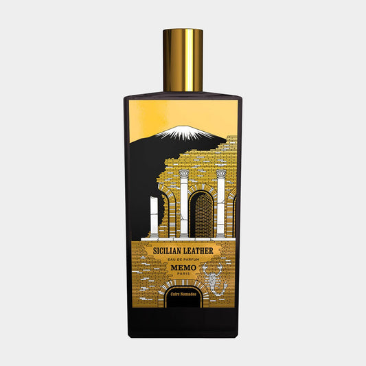 Memo Paris Sicilian Leather sample, a perfume featuring a striking black bottle with golden accents and an illustration of an iconic Sicilian landscape.