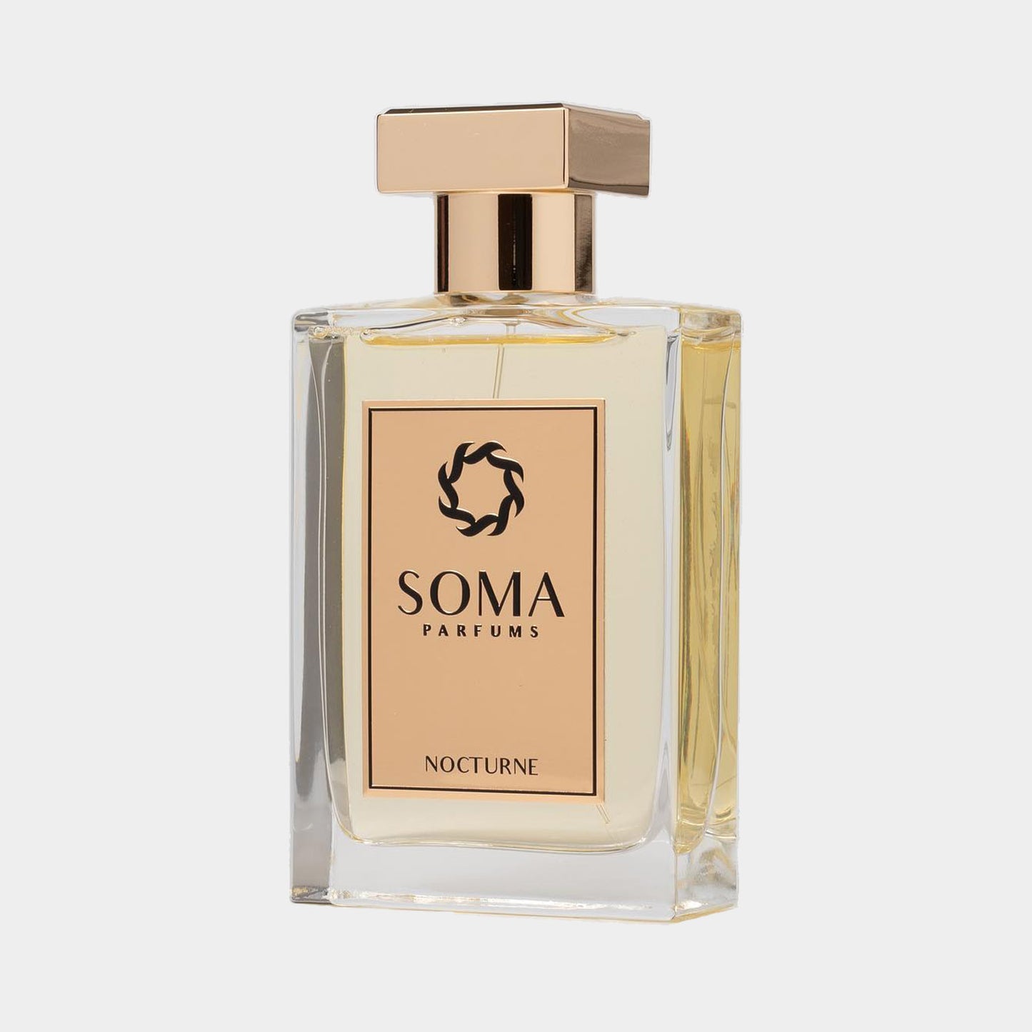 Soma Parfums Nocturne sample, een elegant glazen parfumflesje met een gouden dop en een verfijnde geur.