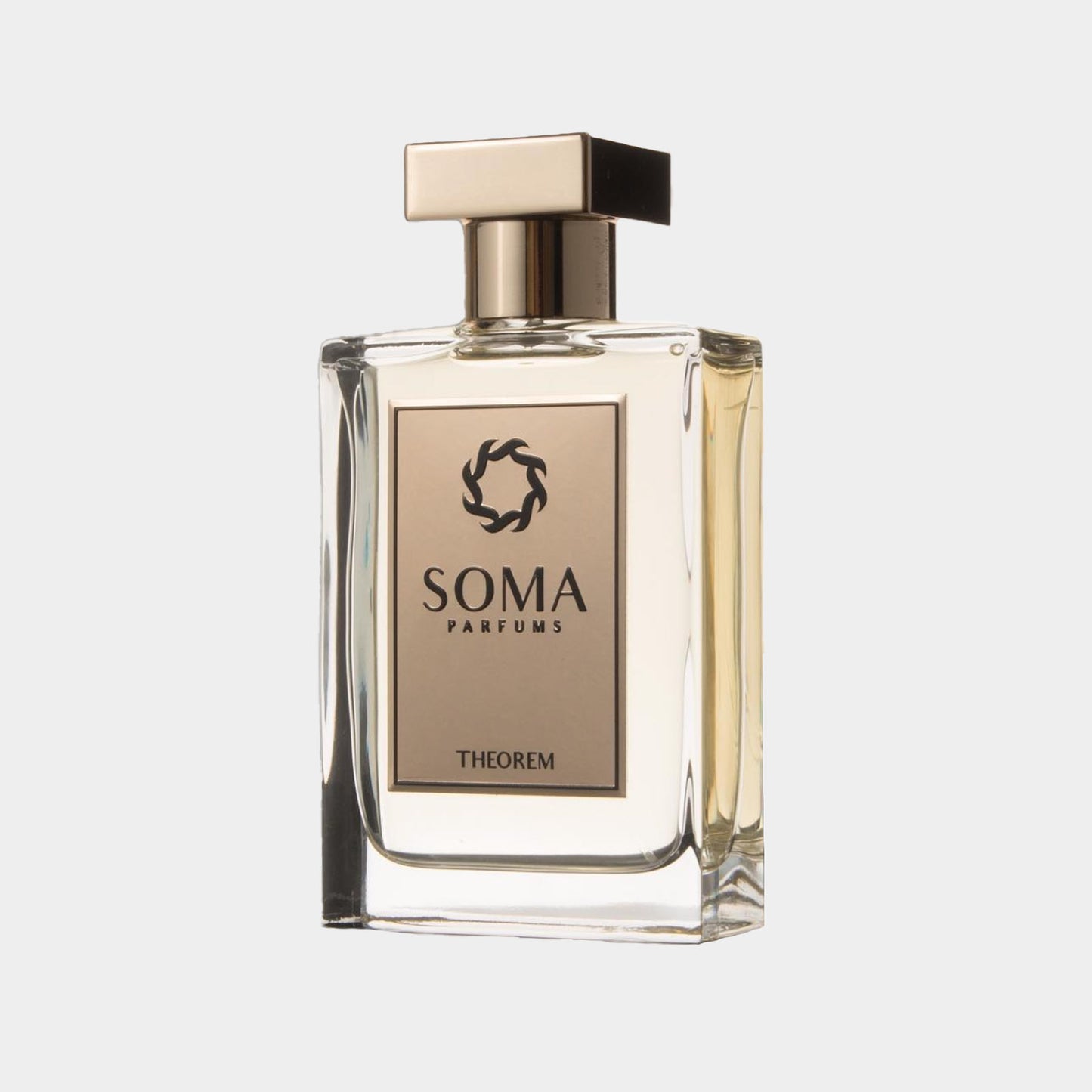 Soma Parfums Theorem sample in a sleek, transparent flacon met een gouden etiket en een gouden dop.