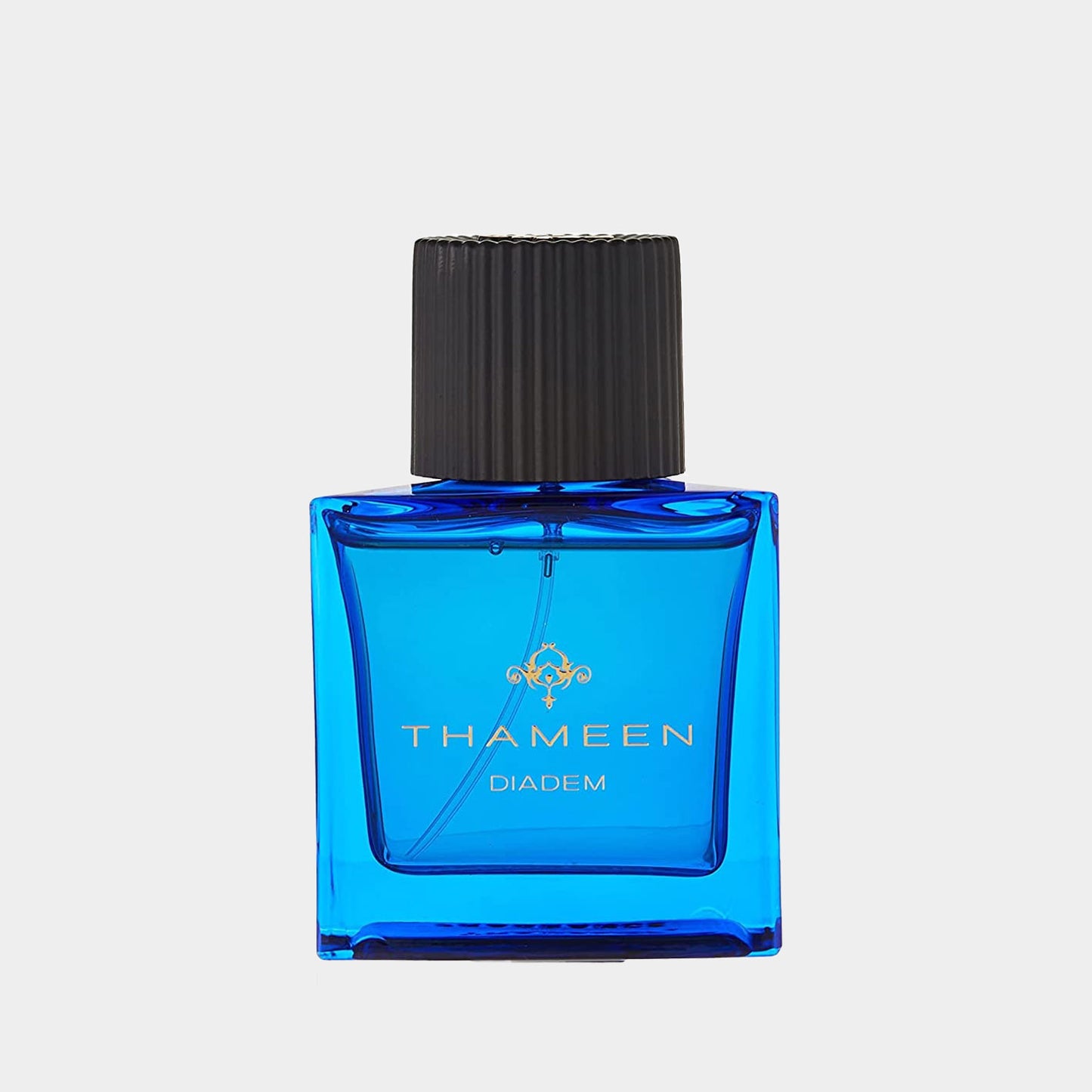 Thameen Diadem EXDP sample, een elegant parfum in een heldere blauwe fles met een zwarte dop.