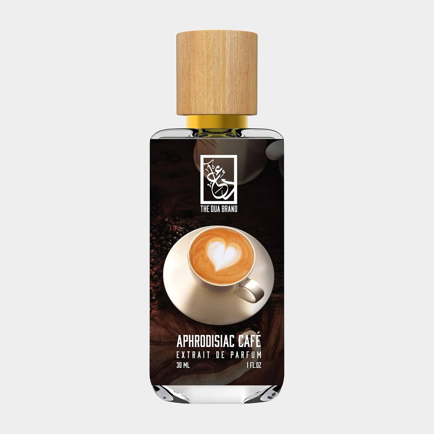 De Dua Aphrodisiac Cafe Sample is een 30 ml parfumfles met een stijlvolle houten dop, afgebeeld met een koffie met hartvormige latte-art.