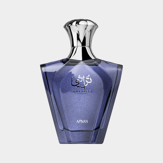 Afnan Perfumes Turathi Blue volfles met een elegante, glazen flacon in een diepe blauwe tint en een glanzende metalen dop.