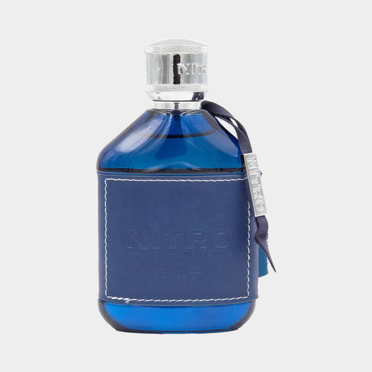 Dumont Nitro Blue Full bottle met een elegante blauwe glazen fles en een leren etiket, perfect voor een verfijnde geurervaring.