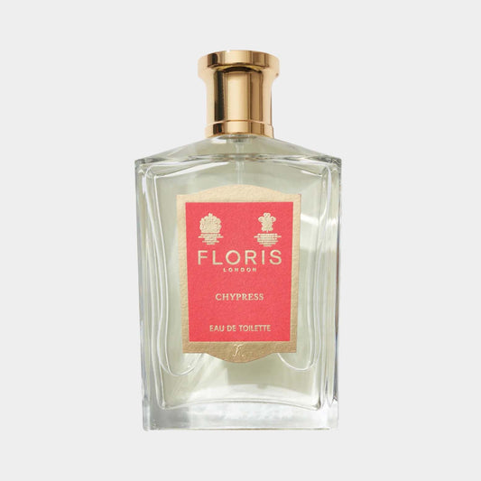Floris London Chypress Full bottle, een elegante parfumflacon met een gouden dop en een roze label, gevuld met Eau de Toilette.