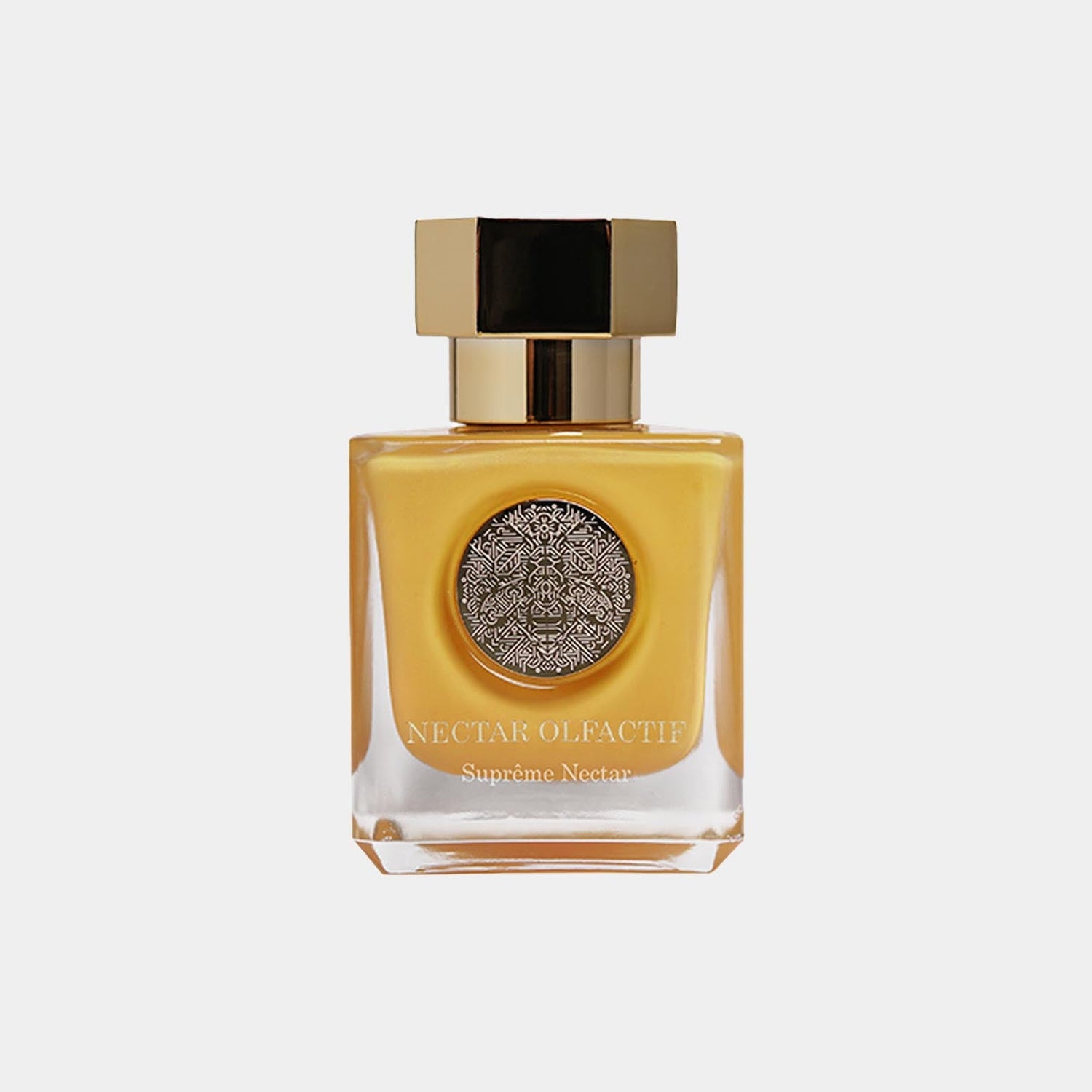 Een elegant glazen parfumflesje van Nectar Olfactif, gevuld met de gouden Supreme Nectar, met een chique, gouden dop en een intricately ontworpen label. Perfect voor liefhebbers van luxe geuren.