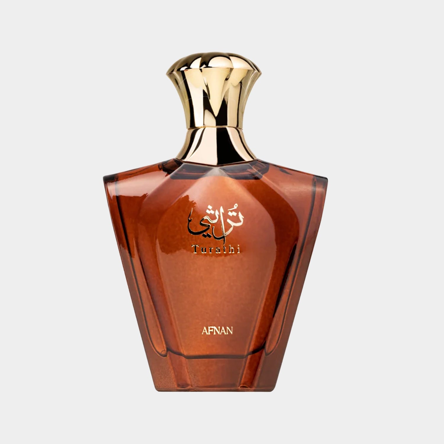 Afnan Perfumes Turathi Brown Sample, een stijlvolle parfumfles met een rijke, bruine tint en een gouden dop, perfect voor een luxe geurervaring.